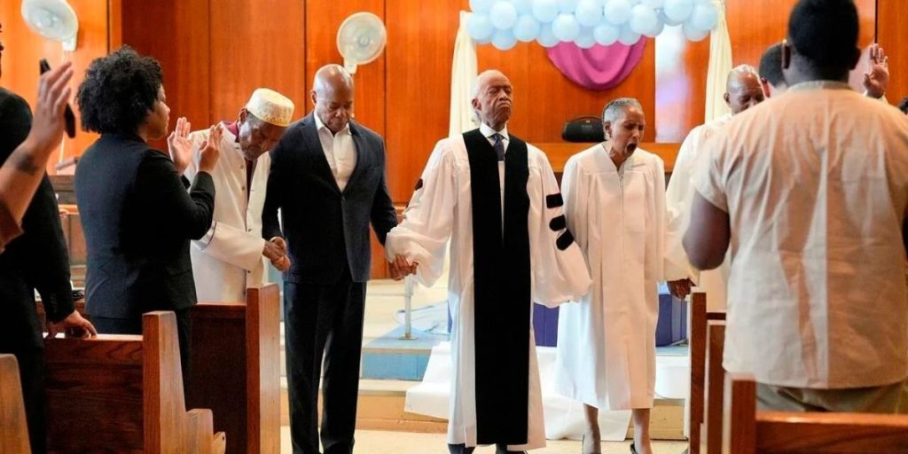 Mayor of New York City baptized in jail by Rev. Al Sharpton on Good Friday